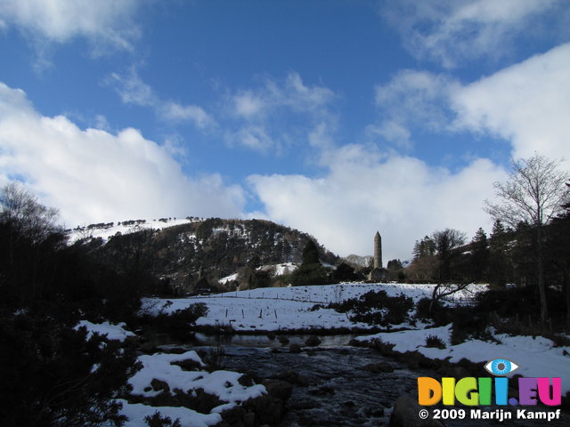 SX02452 Glendalough St Kevin's Church and Round Tower in snow